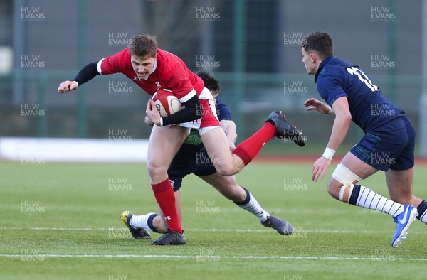 081219 - Wales U19 v Scotland U19, Age Grade International match - Jacob Beetham of Wales takes on Matthew Currie of Scotland