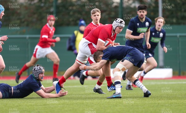 081219 - Wales U19 v Scotland U19, Age Grade International match - Travis Huntley of Wales takes on Nathan Sweeney of Scotland