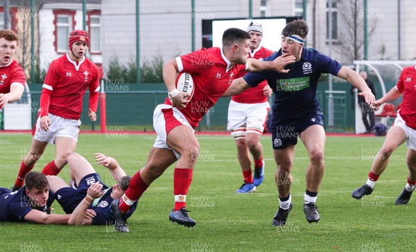081219 - Wales U19 v Scotland U19, Age Grade International match - Bradley Roderick of Wales charges through the Scottish defence to score the second try