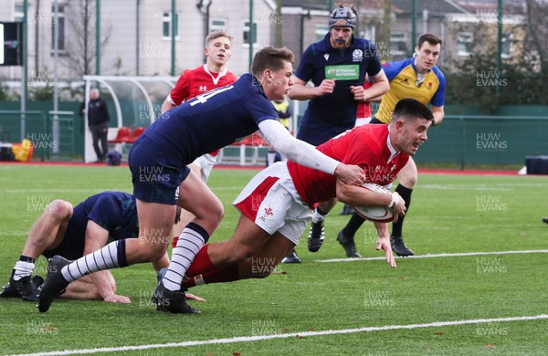 081219 - Wales U19 v Scotland U19, Age Grade International match - Bradley Roderick of Wales charges through the Scottish defence to score the second try