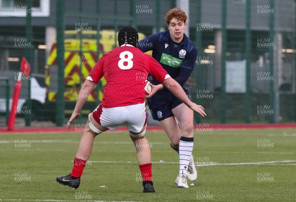 081219 - Wales U19 v Scotland U19, Age Grade International match - Harry Mercer of Scotland takes on Morgan Strong of Wales