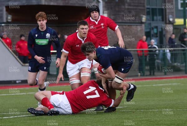 081219 - Wales U19 v Scotland U19, Age Grade International match - Mason Nicholls of Scotland is tackled by Theo Bevacqua of Wales