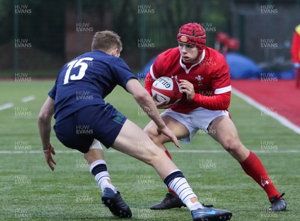 081219 - Wales U19 v Scotland U19, Age Grade International match - Jake Thomas of Wales looks to get past Nathan Sweeney of Scotland