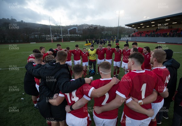 081219 - Wales U19 v Scotland U19, Age Grade International match - The Wales U19 team huddle together at the end of the match