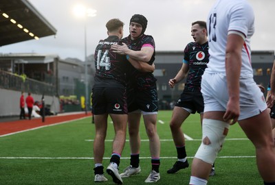 191225 - Wales U19s v England U19s - International Friendly - Rhys Cole of Wales celebrates scoring a try with team mates
