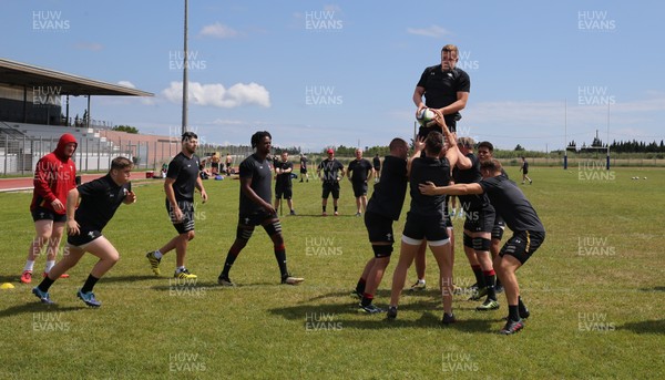 060618 - Wales U20 Training Session - Jack Pope takes the ball in line out practice during a training session ahead of the match against Japan