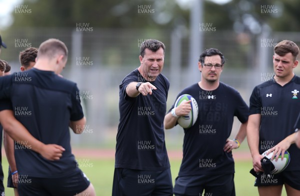 060618 - Wales U20 Training Session - Geraint Lewis, coach, works with the forwards during a training session ahead of the match against Japan