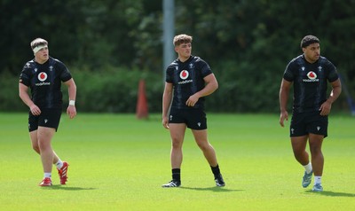 090626 - Wales U20 Rugby Training - Dylan James, Sam Morgan and James Talamai during a training session ahead of the U20 World Cup in Georgia
