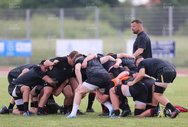 290518 - Wales U20 Runout - Chris Horsman, coach, oversees scrummaging practice during training runout ahead of the team's first match in the World Rugby U20 Championship against Australia