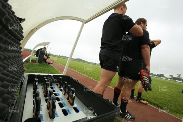 280518 - Wales U20 Squad Training session - The players attach their GPS units ahead of the training session