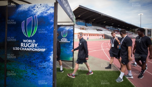 120618 -  Wales U20 v Argentina U20, World Rugby U20 Championship - The Wales team make their way to the changing room after taking a look at the pitch at the Stade D'Honneur Du Parc Des Sports Et De L'Amitie, where they take on Argentina
