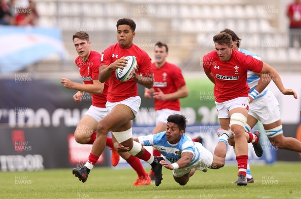120618 -  Wales U20 v Argentina U20, World Rugby U20 Championship, 5th Place Semi Final - Ben Thomas of Wales is send flying as he is tackled