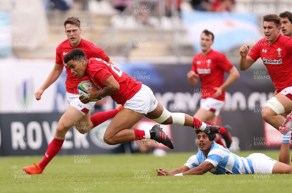 120618 -  Wales U20 v Argentina U20, World Rugby U20 Championship, 5th Place Semi Final - Ben Thomas of Wales is send flying as he is tackled