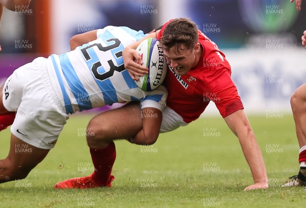 120618 -  Wales U20 v Argentina U20, World Rugby U20 Championship, 5th Place Semi Final - Max Llewellyn of Wales is tackled by Santiago Chocobares of Argentina