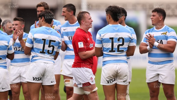 120618 -  Wales U20 v Argentina U20, World Rugby U20 Championship, 5th Place Semi Final -  Tommy Reffell of Wales is applauded off the pitch by the Argentinian team at the end of the match