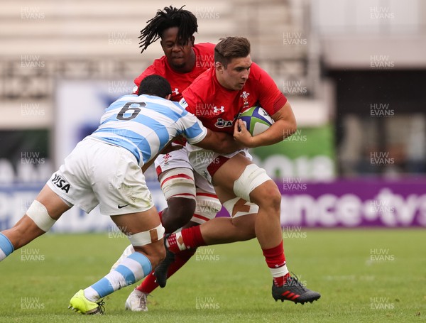 120618 -  Wales U20 v Argentina U20, World Rugby U20 Championship, 5th Place Semi Final - Taine Basham of Wales with Max Williams of Wales in support, takes on Joaquin De La Vega of Argentina