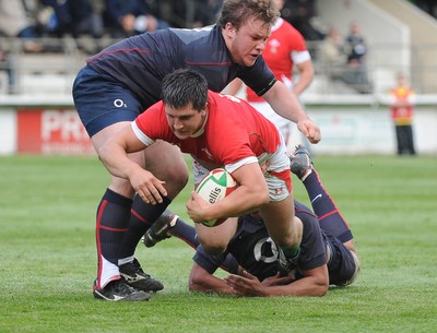 13.05.10 - Wales Under 20 v England Regional Academies XV  Wales' Ed Siggery is brought down 