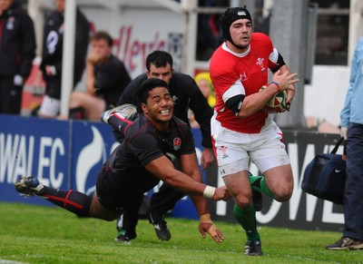 13.05.10 - Wales Under 20 v England Regional Academies XV  Wales' Adam Hughes breaks through on his way to score a try 