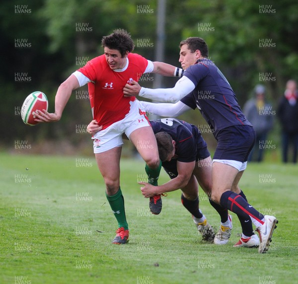 13.05.10 - Wales Under 20 v England Regional Academies XV  Wales' Rhys Downes passes as he is tackled 