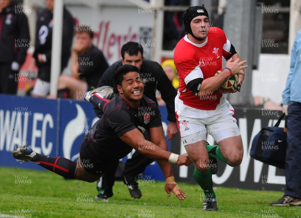13.05.10 - Wales Under 20 v England Regional Academies XV  Wales' Adam Hughes breaks through on his way to score a try 