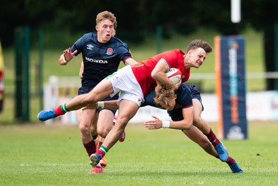 060625 - Wales U20 v England U20 - U20 World Championship Warm Up - Sion Davies of Wales is tackled by Will Knight of England