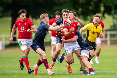 060625 - Wales U20 v England U20 - U20 World Championship Warm Up - Sion Davies of Wales is tackled by Connor Treacey of England