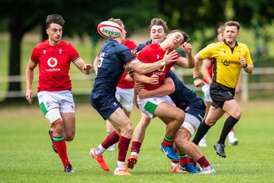 060625 - Wales U20 v England U20 - U20 World Championship Warm Up - Sion Davies of Wales is tackled by Connor Treacey of England and Ben Redshaw of England