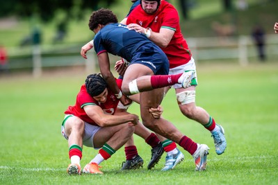060625 - Wales U20 v England U20 - U20 World Championship Warm Up - Jack Woods of Wales tackles Noah Caluori of England