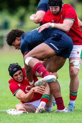 060625 - Wales U20 v England U20 - U20 World Championship Warm Up - Jack Woods of Wales tackles Noah Caluori of England