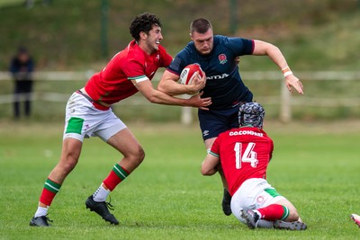 060625 - Wales U20 v England U20 - U20 World Championship Warm Up - George Timmins of England is tackled by Ioan Duggan of Wales and Elis Price of Wales