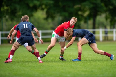 060625 - Wales U20 v England U20 - U20 World Championship Warm Up - Lewis Edwards of Wales is tackled by Ben Redshaw of England