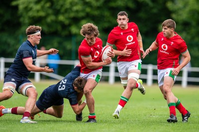 060625 - Wales U20 v England U20 - U20 World Championship Warm Up - Aidan Boshoff of Wales I tackled by Ben Coen of England