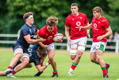 060625 - Wales U20 v England U20 - U20 World Championship Warm Up - Aidan Boshoff of Wales I tackled by Ben Coen of England