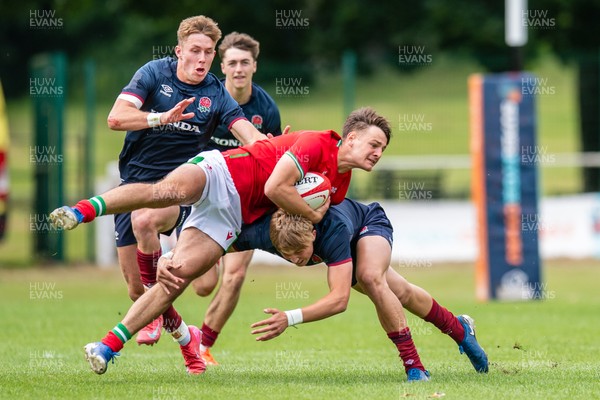 060625 - Wales U20 v England U20 - U20 World Championship Warm Up - Sion Davies of Wales is tackled by Will Knight of England