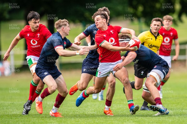 060625 - Wales U20 v England U20 - U20 World Championship Warm Up - Sion Davies of Wales is tackled by Connor Treacey of England
