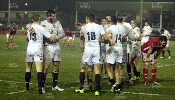 150313 Wales U20 v England U20 - Under 20s Six Nations - England's players celebrate victory as Wales players despair 