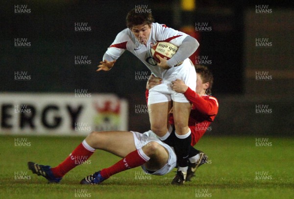 160307 - Wales U20 v England U20 - Under 21 Six Nations - England's Adam Powell is tackled by Rhys Priestland 