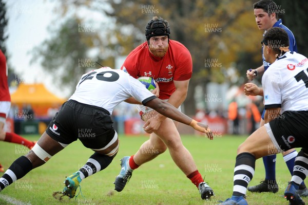 120619 - Wales U20 v Fiji U20 - World Rugby Under 20 Championship -  Kemsley Mathias of Wales drives into Tiri Shaw of Fiji