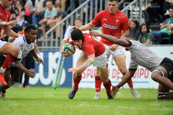 120619 - Wales U20 v Fiji U20 - World Rugby Under 20 Championship -  Ioan Davies of Walesslips through the Fiji cover defence