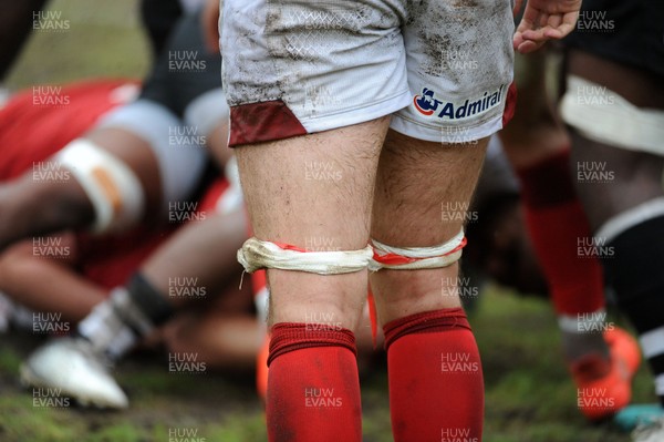 120619 - Wales U20 v Fiji U20 - World Rugby Under 20 Championship -  Wales player with strapping on his legs