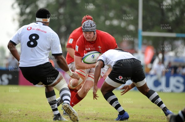 120619 - Wales U20 v Fiji U20 - World Rugby Under 20 Championship -  Jac Price of Wales drives into the Fiji defence 