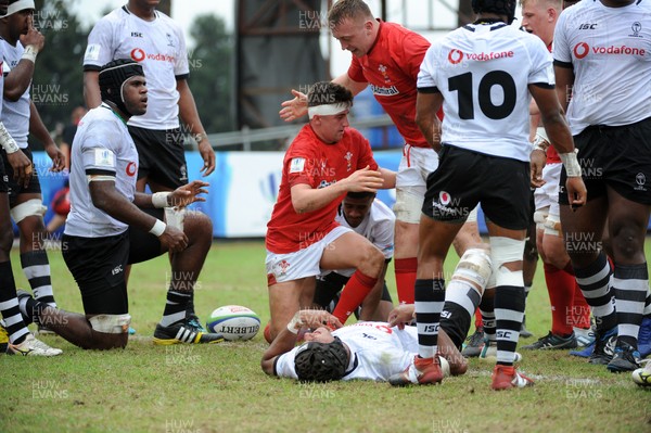 120619 - Wales U20 v Fiji U20 - World Rugby Under 20 Championship -  Dafydd Buckland of Wales celebrates his first half try with Tommy Reffell 