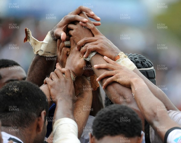 120619 - Wales U20 v Fiji U20 - World Rugby Under 20 Championship -  Fiji players show solidarity on their own goaline after conceding a try