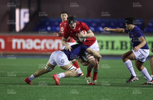 070324 - Wales U20 v France U20, U20 6 Nations - Nick Thomas of Wales is tackled