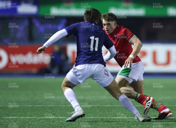 070324 - Wales U20 v France U20, U20 6 Nations - Macs Page of Wales takes on Nathan Bollengier of France