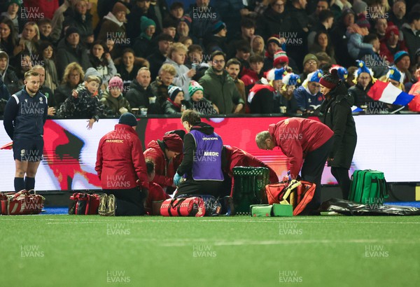 070324 - Wales U20 v France U20, U20 6 Nations - Harri Ackerman of Wales receives treatment after being injured