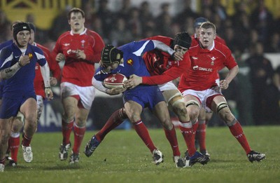 14.03.08 ..  Wales U20 v France U20, U20 Six Nations, Newport -  Wales' Josh Turnbull collars France's Mathieu Belie 