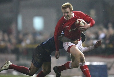 14.03.08 ..  Wales U20 v France U20, U20 Six Nations, Newport -  Wales' Jimmy Norris is tackled by France's Mathieu Belie 