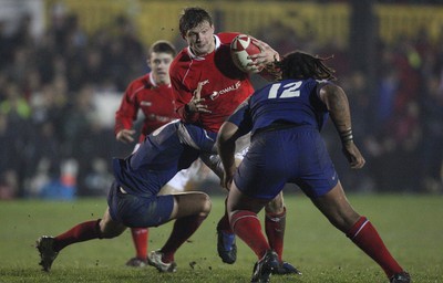 14.03.08 ..  Wales U20 v France U20, U20 Six Nations, Newport -  Wales' Daniel Biggar takes on France's Mathieu Belie and Mathieu Basteraud  