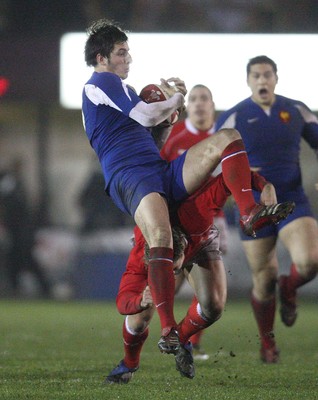 14.03.08 ..  Wales U20 v France U20, U20 Six Nations, Newport -  France's Julien Dumora is upended by Wales' Gareth Owen 